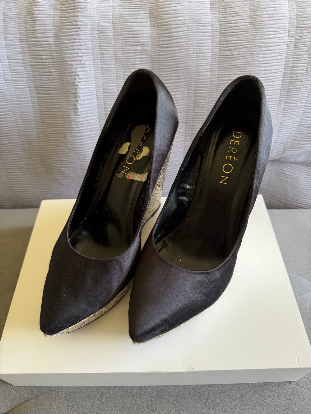 Dereon Black Pointed Toe Pumps with Gold Trim
